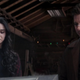 Kate and Clint watch the Ronin suit burn.